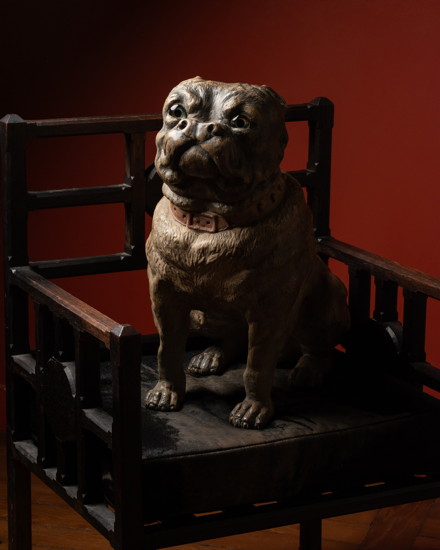 A Group of Three Painted Terracotta Pugs with Sulphide Eyes
