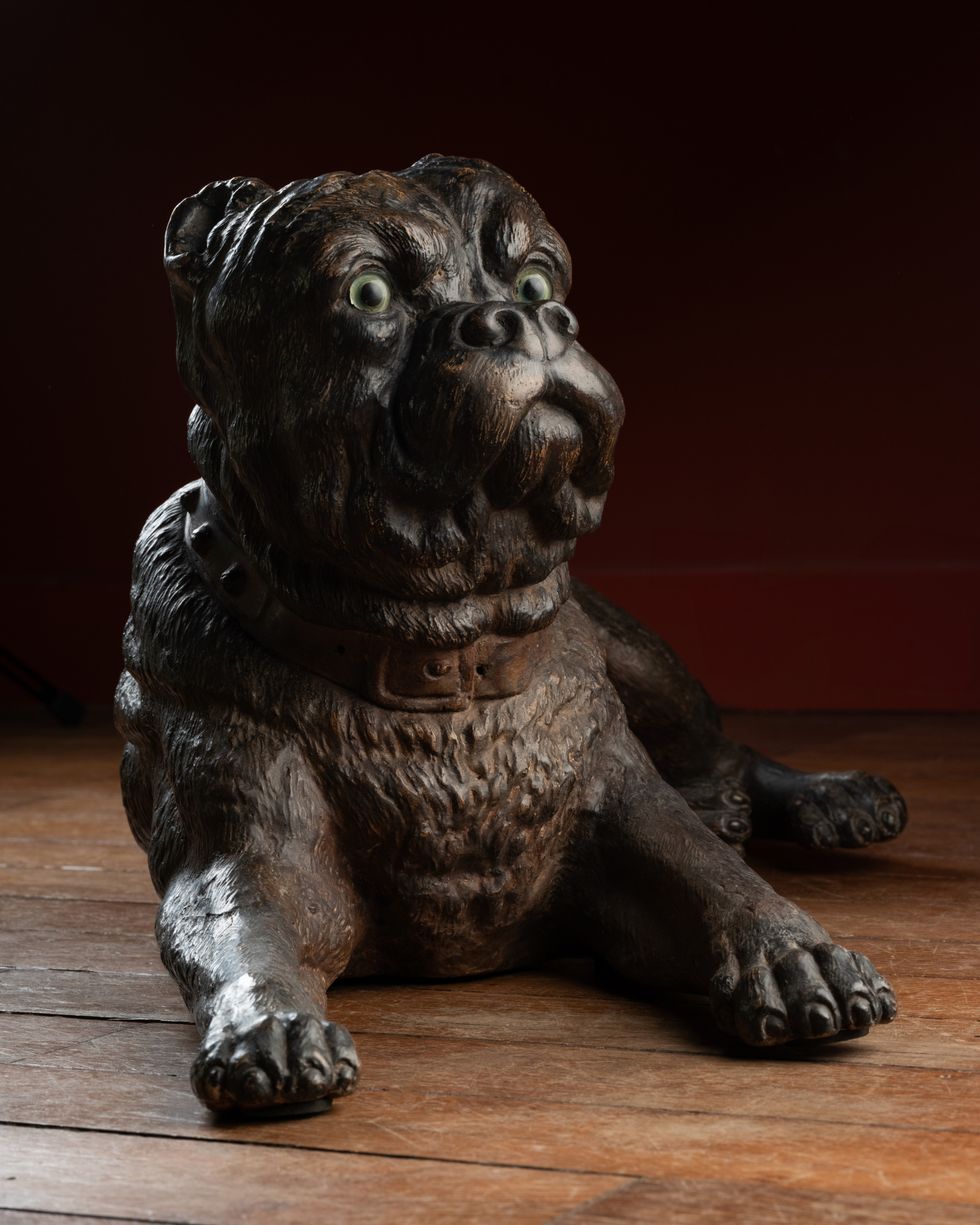 A Group of Three Painted Terracotta Pugs with Sulphide Eyes