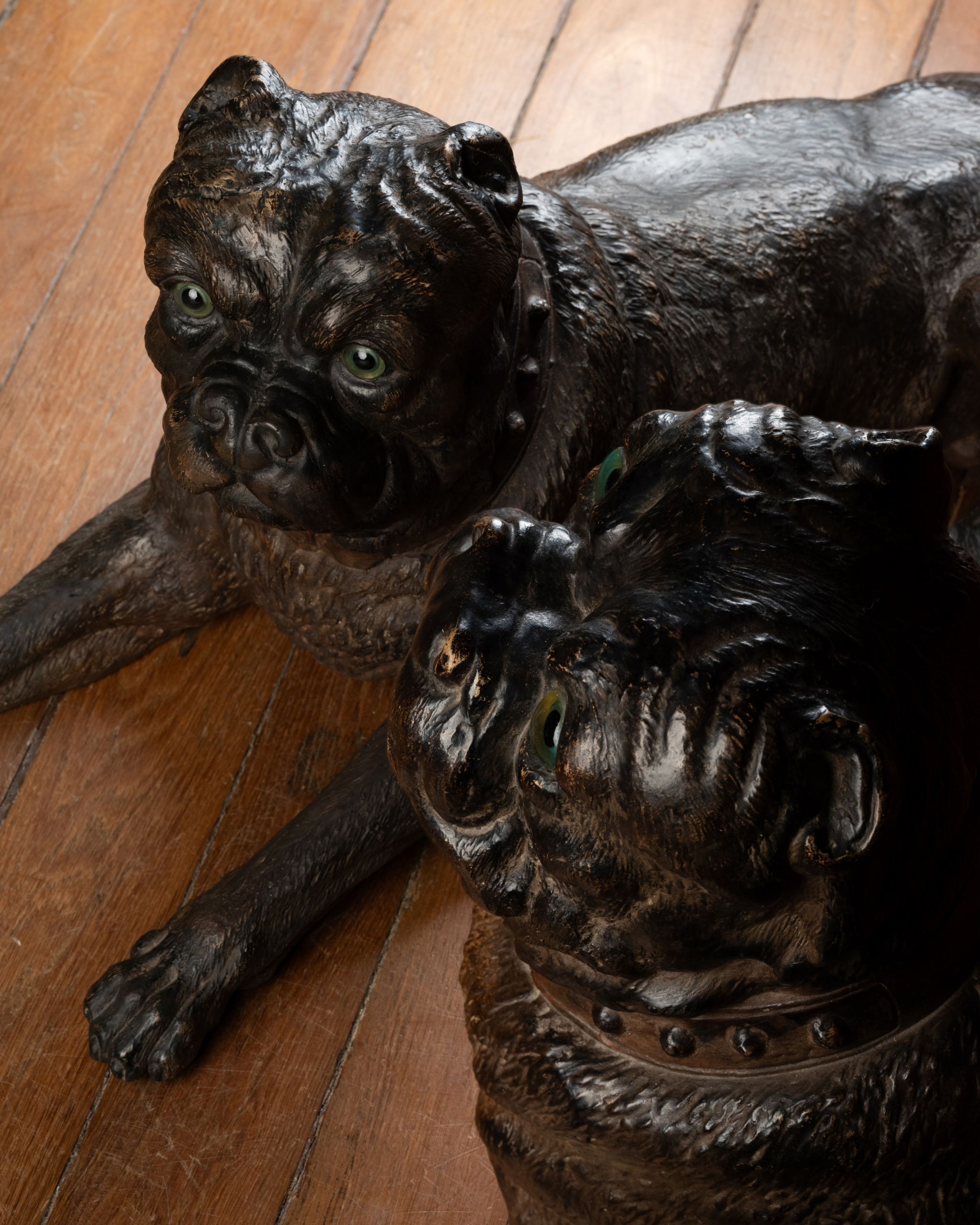 A Group of Three Painted Terracotta Pugs with Sulphide Eyes