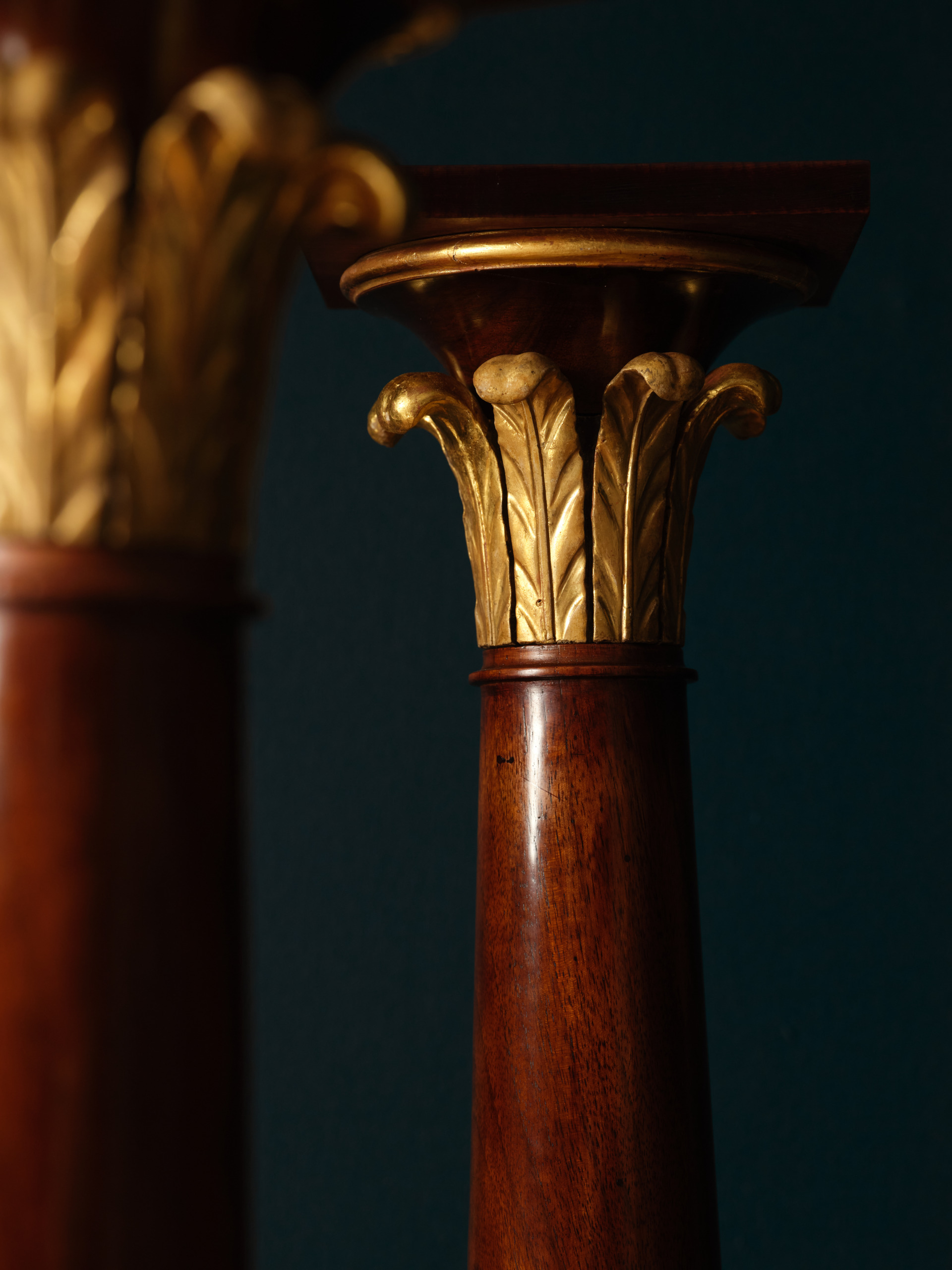 A Pair of Mahogany and Giltwood Torchères