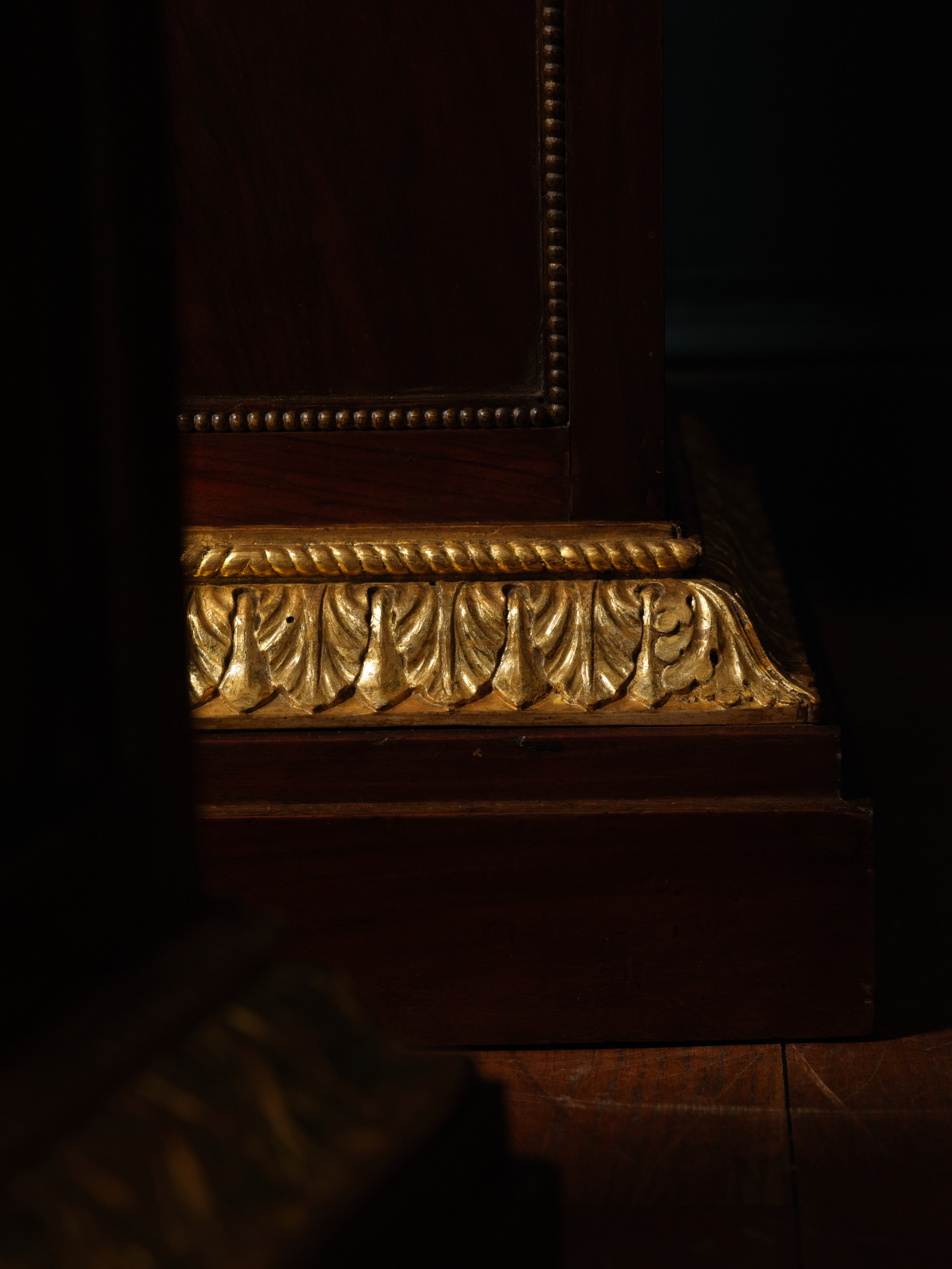 A Pair of Mahogany and Giltwood Torchères
