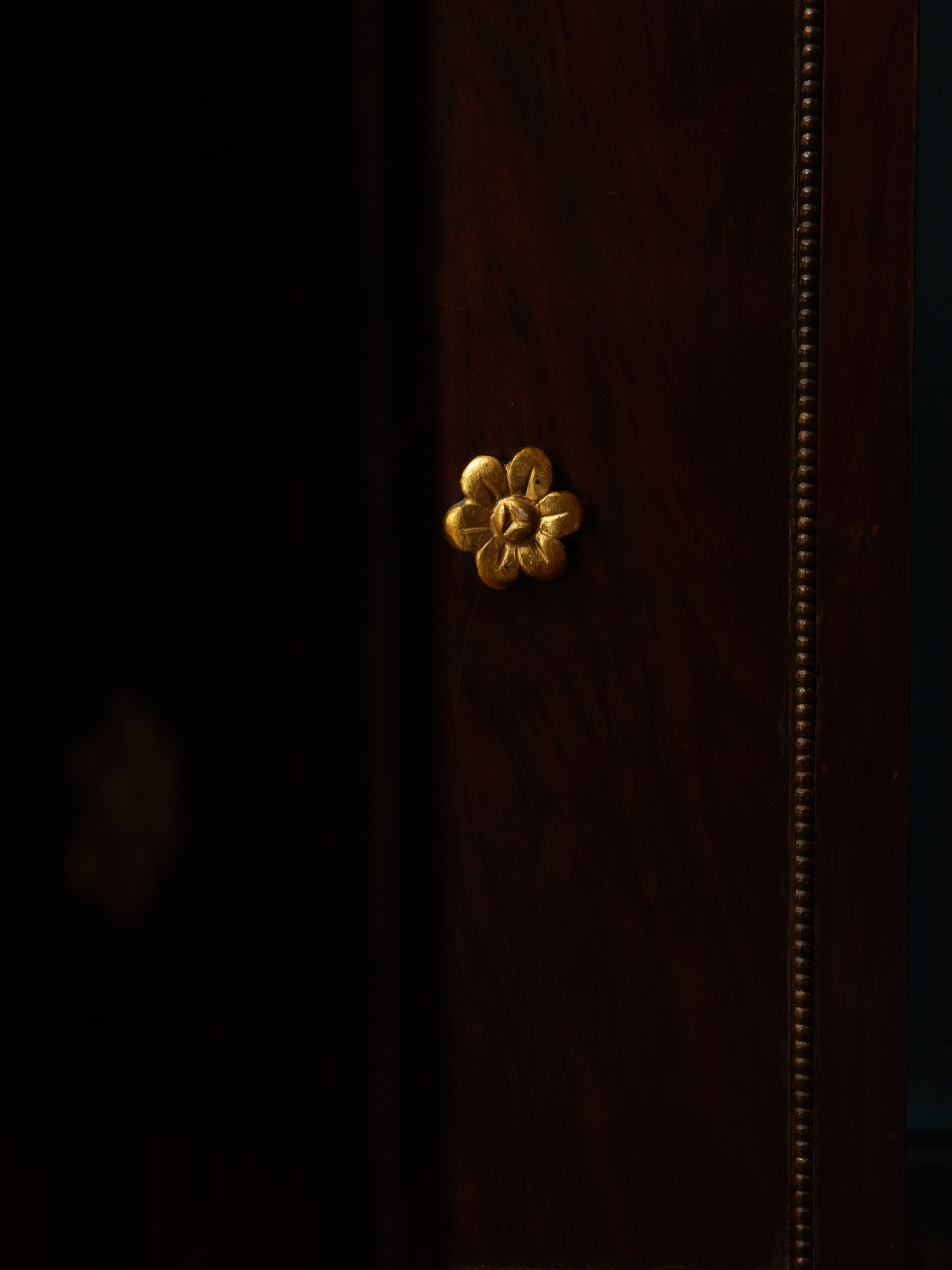 A Pair of Mahogany and Giltwood Torchères